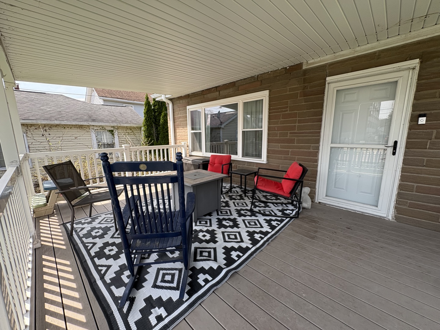 913 Canal Street Ottawa, IL 61350 - Photo 3 of 30 an outdoor sitting area with furniture and wooden deck