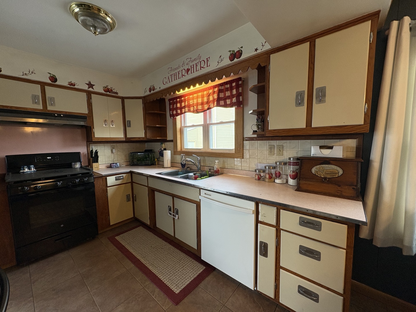 913 Canal Street Ottawa, IL 61350 - Photo 10 of 30 a kitchen with a sink stove and microwave