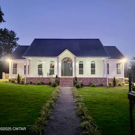 a view of a house with a garden