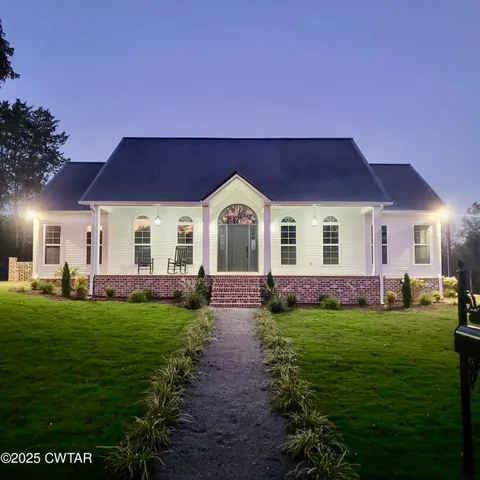 a view of a house with a garden