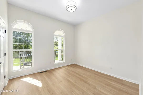 a house view with a backyard space