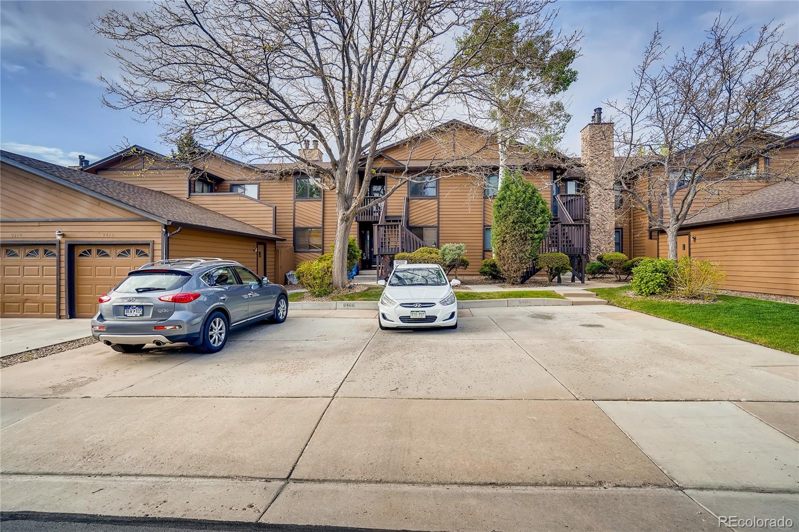 9412 West 89th Circle Westminster, CO 80021 - Photo 1 of 10 a car parked on the side of a street