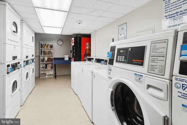 a view of living room with furniture and flat screen tv