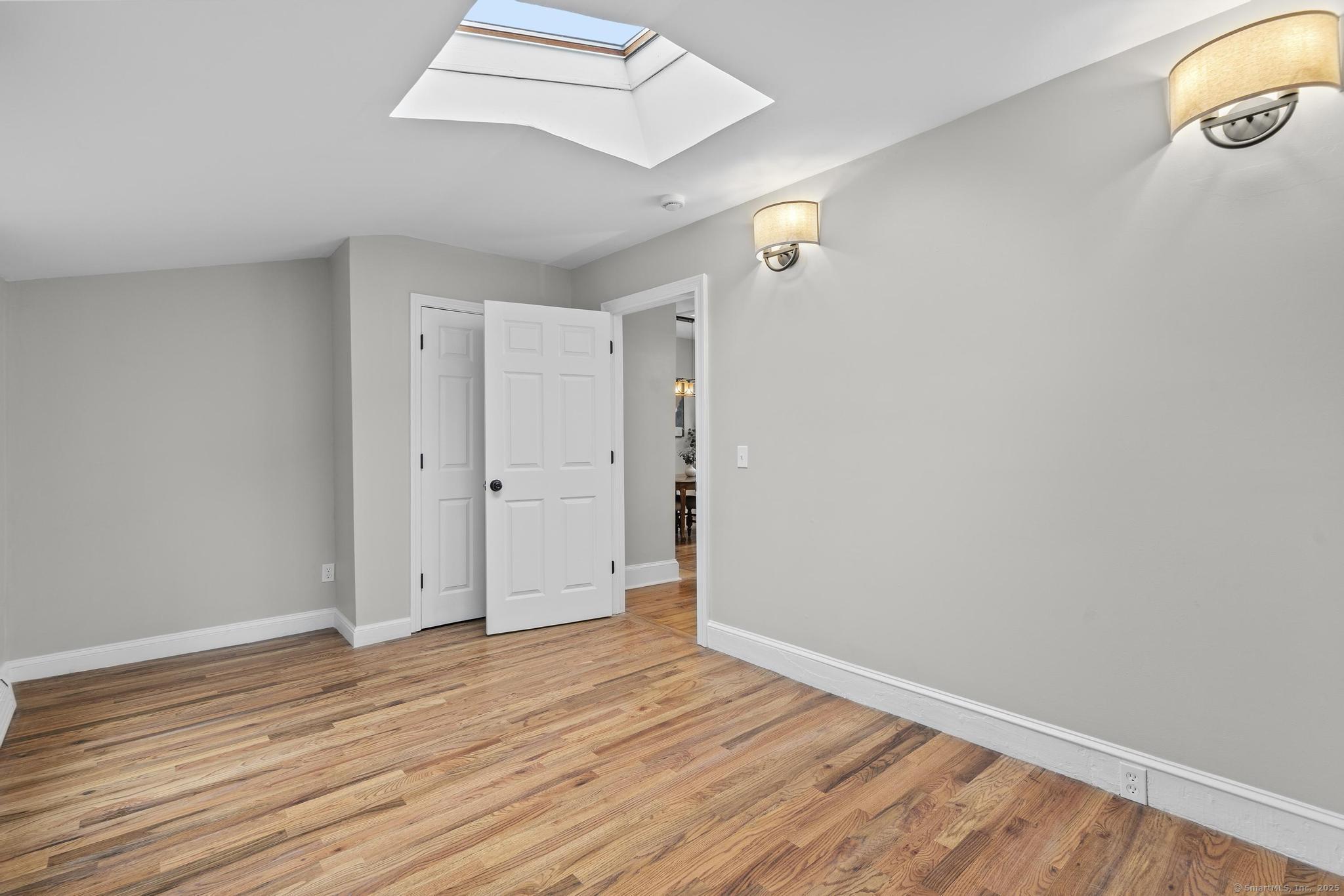 72 Spencer Street Suffield, CT 06078 - Photo 23 of 39 a view of empty room with wooden floor