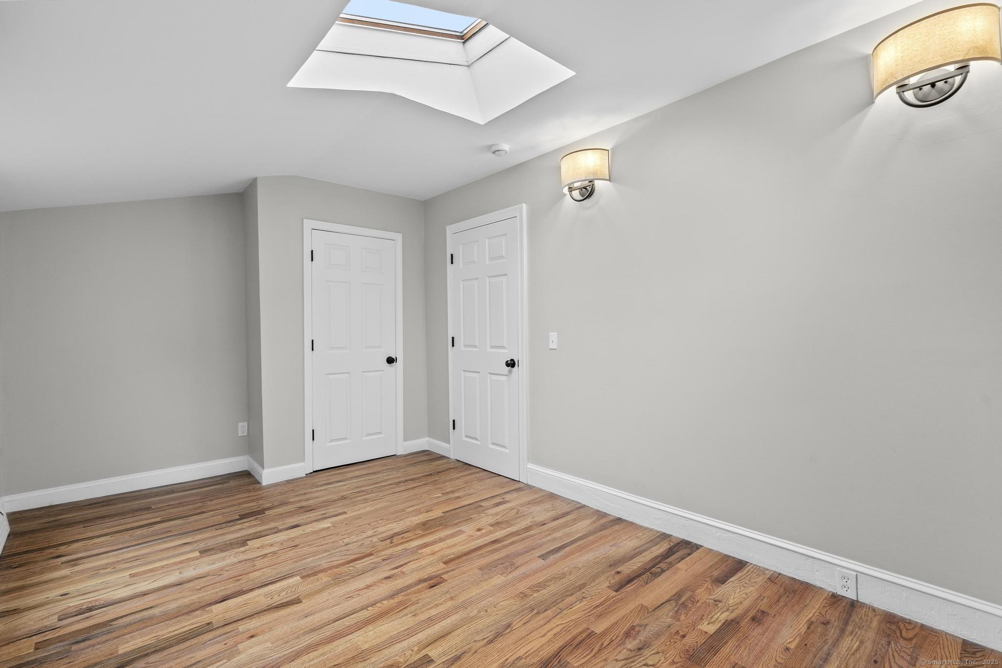 72 Spencer Street Suffield, CT 06078 - Photo 24 of 39 a view of empty room with wooden floor