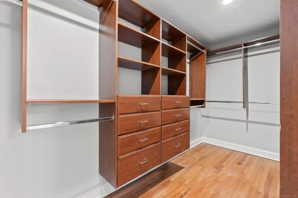 a view of an empty walk in closet