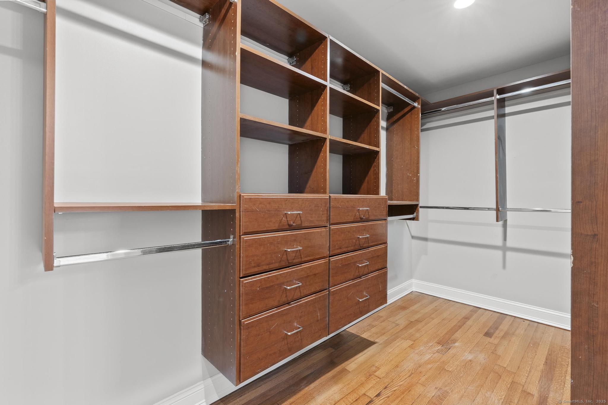 72 Spencer Street Suffield, CT 06078 - Photo 5 of 39 a view of an empty walk in closet