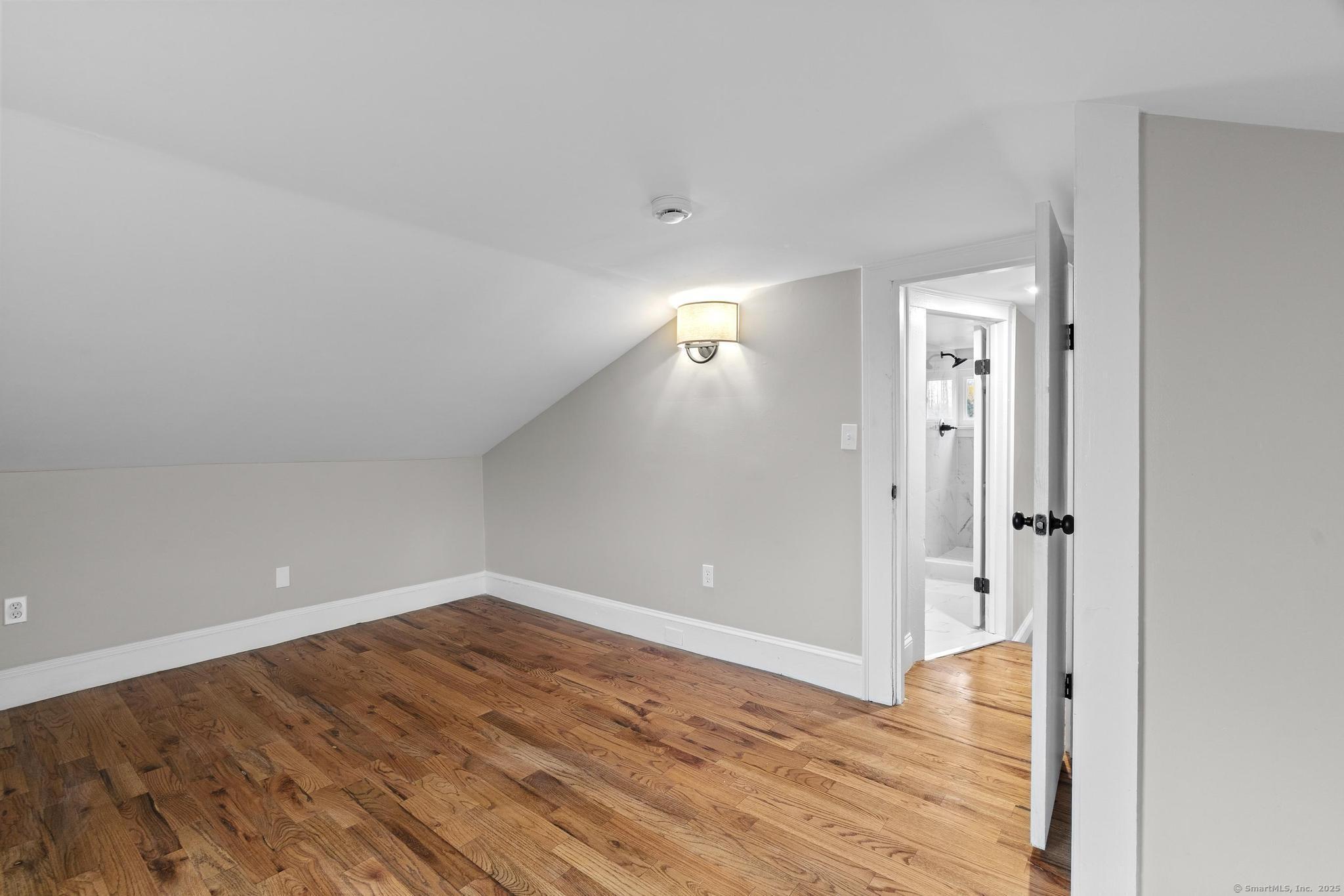 72 Spencer Street Suffield, CT 06078 - Photo 8 of 39 wooden floor in an empty room
