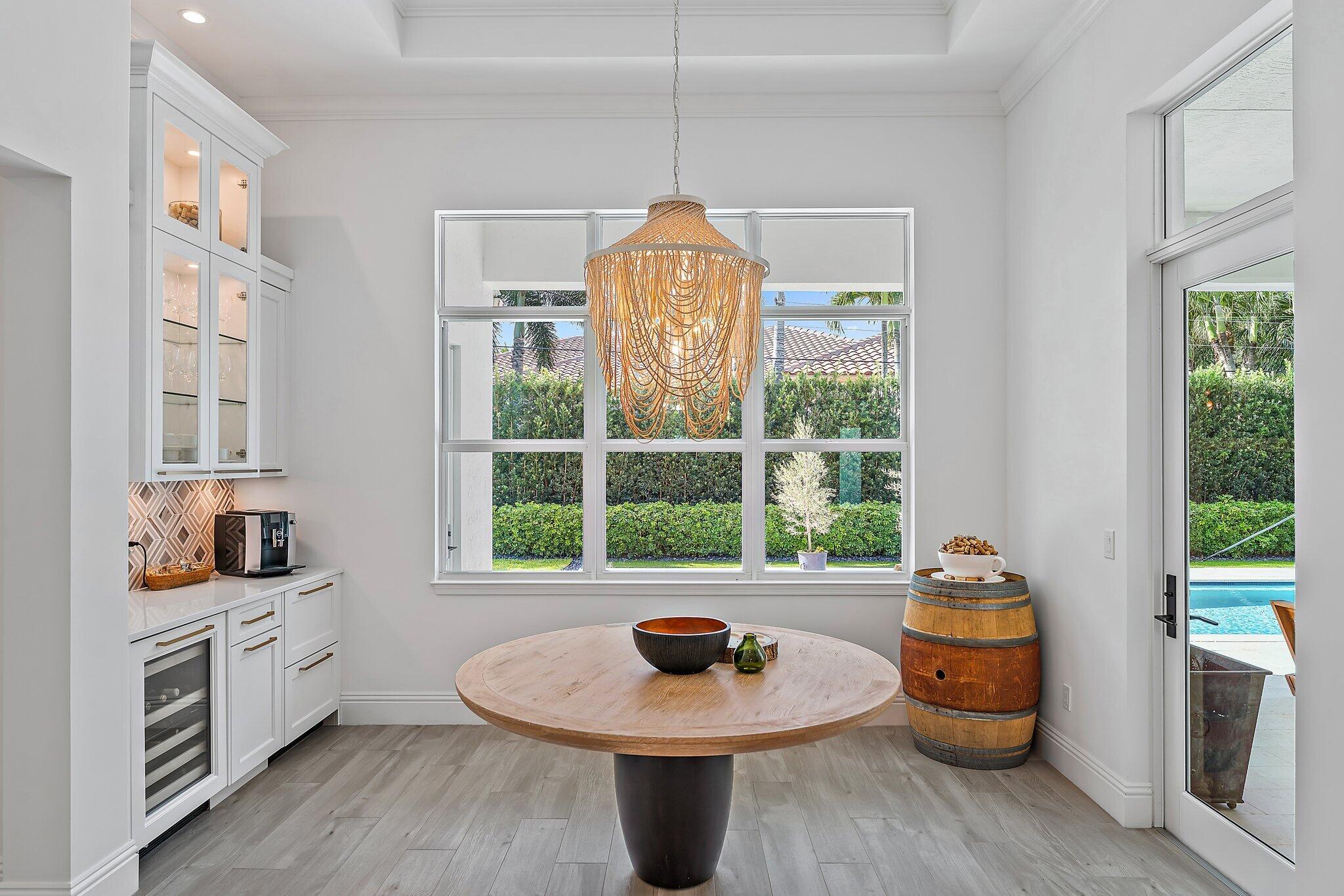5456 Hibiscus Road Jupiter, FL 33458 - Photo 16 of 48 a living room with furniture and a window