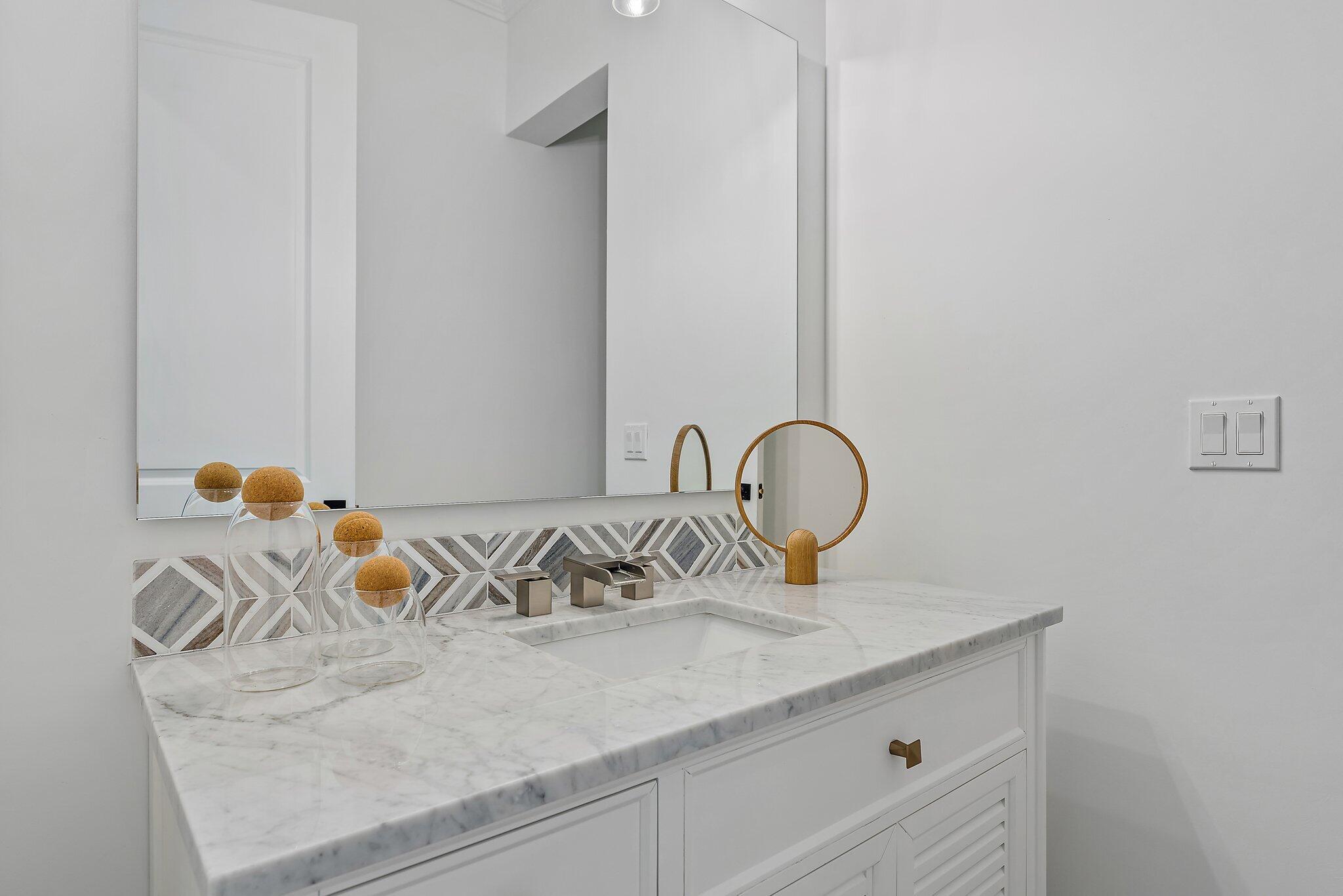 5456 Hibiscus Road Jupiter, FL 33458 - Photo 36 of 48 a close view of sink and tap