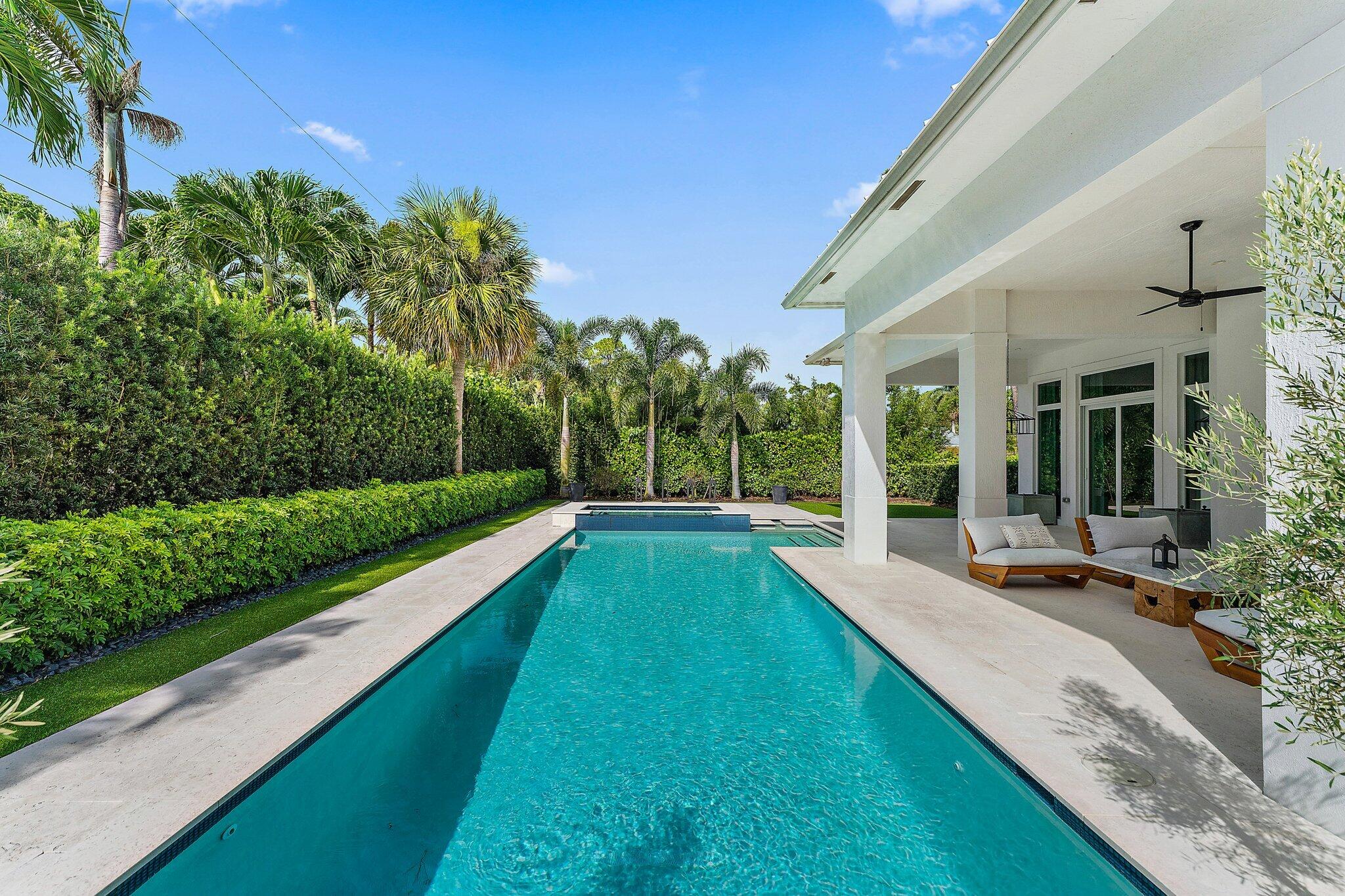 5456 Hibiscus Road Jupiter, FL 33458 - Photo 42 of 48 a view of swimming pool with a patio