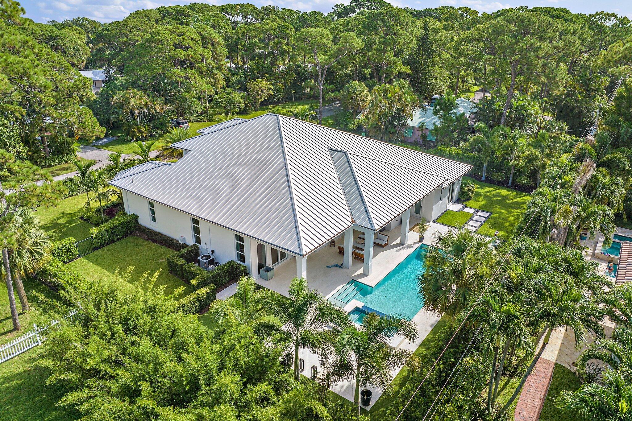 5456 Hibiscus Road Jupiter, FL 33458 - Photo 45 of 48 an aerial view of a house
