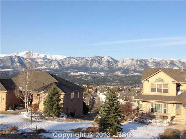15351 Ridgefield Lane Colorado Springs, CO 80921 - Photo 2 of 15 view of Air Force Academy, Front Range and Pikes Peak, Note privacy while sitting on your front porch