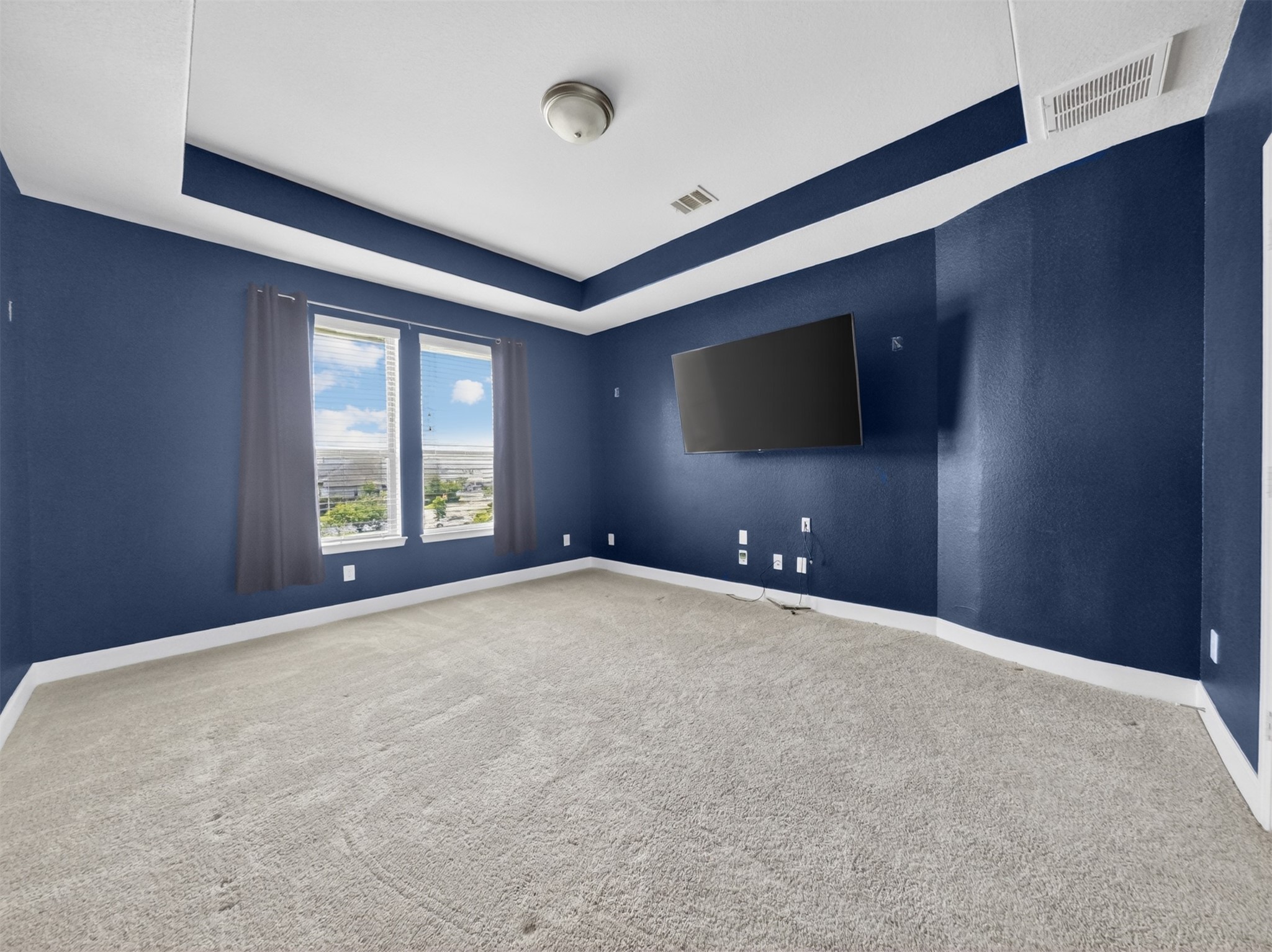 4343 Martin Ridge Drive Manvel, TX 77578 - Photo 29 of 50 a view of an empty room with a flat screen tv