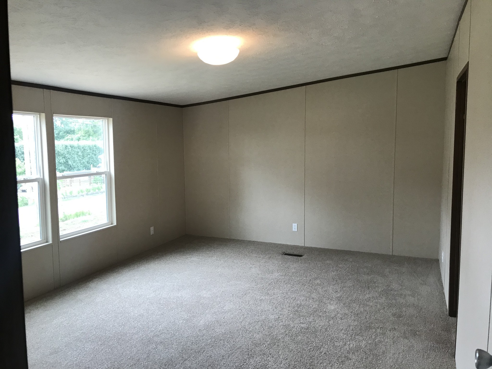 139 Harbin Road Fayetteville, TN 37334 - Photo 5 of 13 an empty room with a window