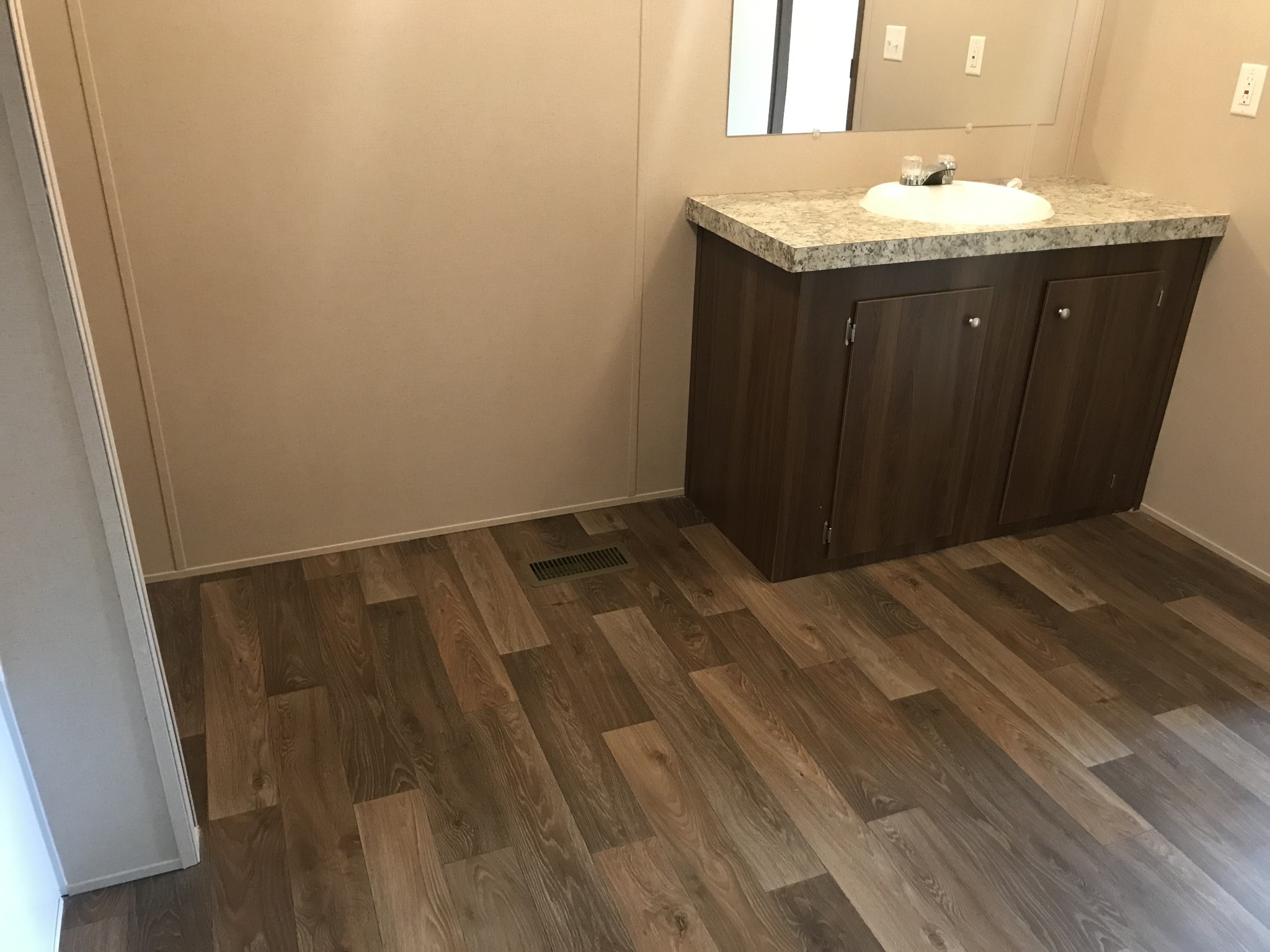 139 Harbin Road Fayetteville, TN 37334 - Photo 8 of 13 a bathroom with a granite countertop sink and vanity