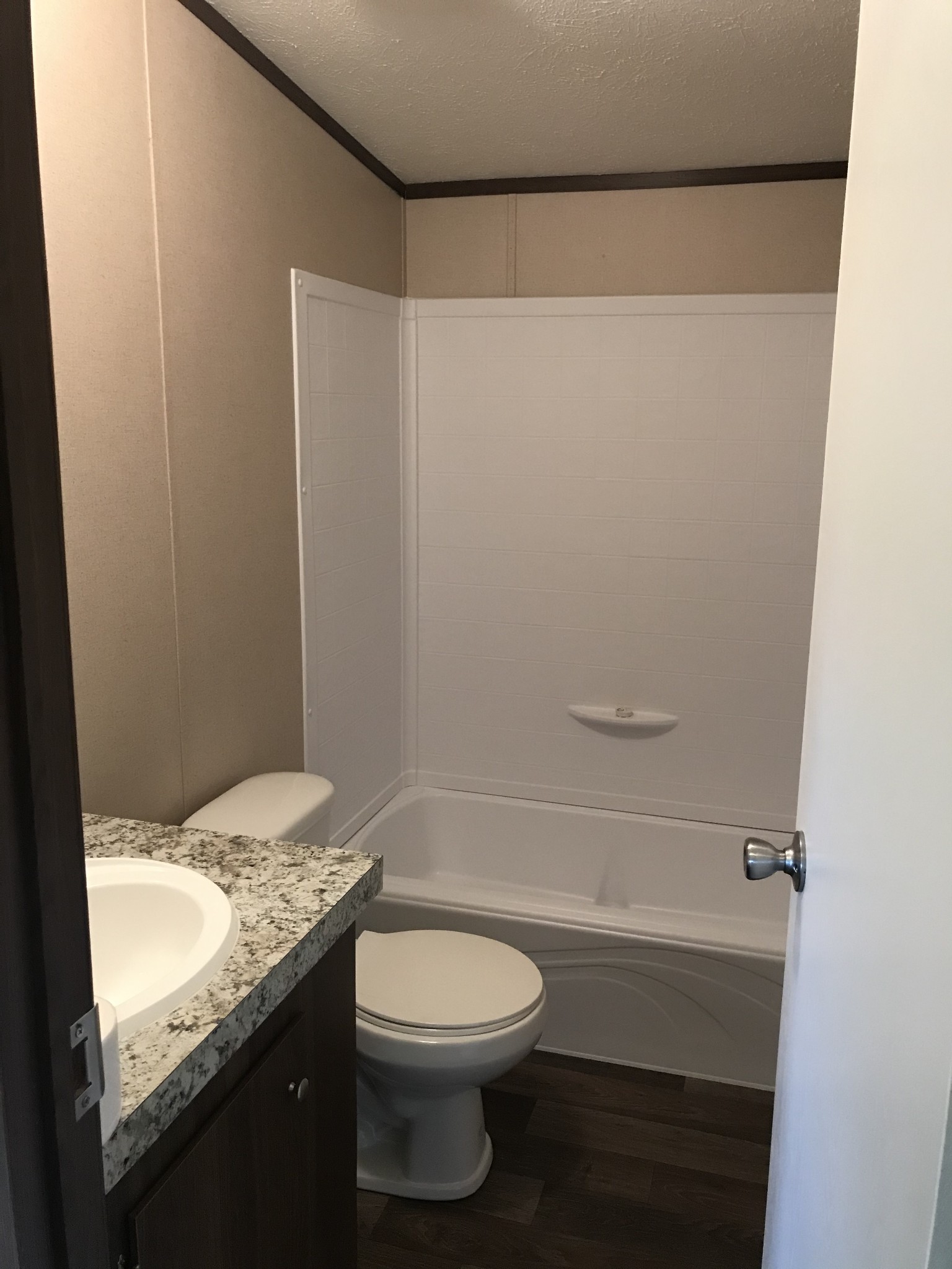 139 Harbin Road Fayetteville, TN 37334 - Photo 9 of 13 a bathroom with a granite countertop sink toilet and shower