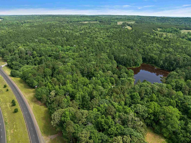 a view of a field with an outdoor space