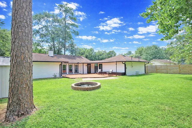 a front view of house with yard and seating area