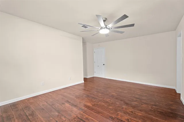 a white bath tub sitting next to a white sink