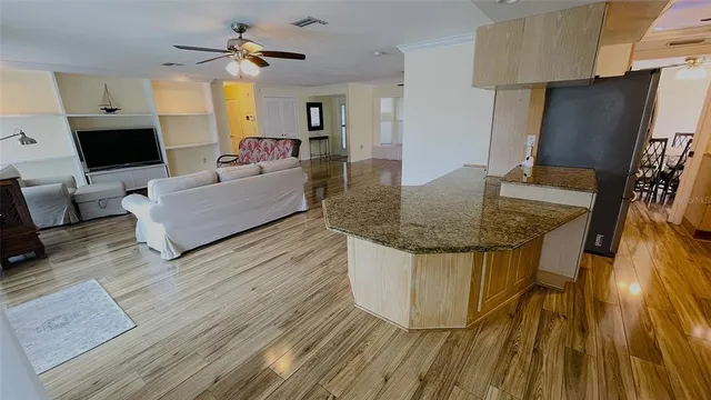 a spacious bathroom with double vanity and a mirror