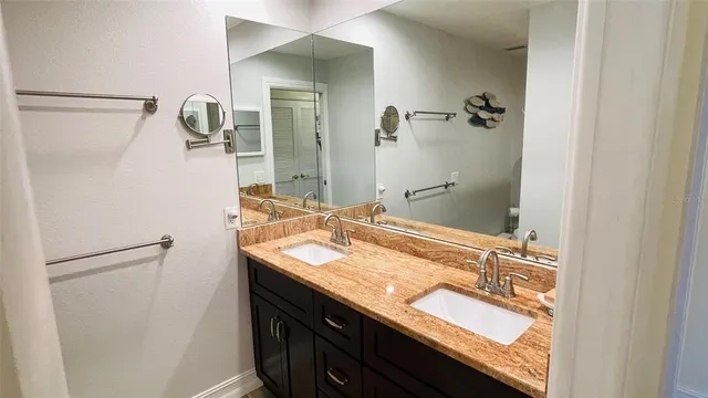 a view of a dining room with furniture and a window