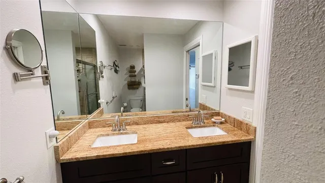 a view of a livingroom with furniture and a window