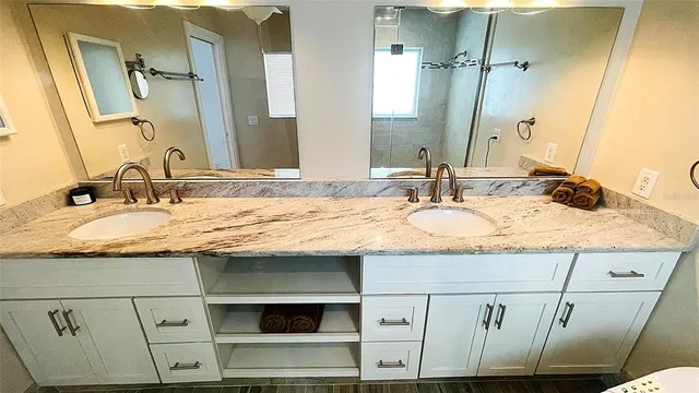 a view of swimming pool with outdoor seating and patio