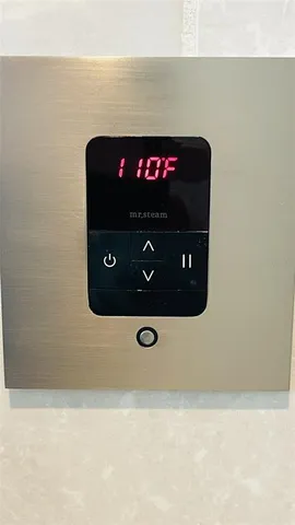 a view of a backyard with sitting area