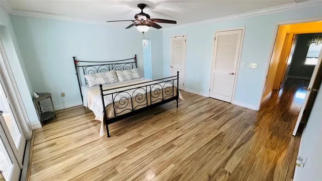 a backyard of a house with barbeque oven table and chairs