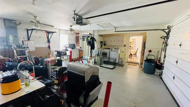 a view of a swimming pool with a lounge chair