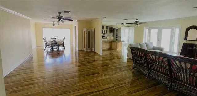 a kitchen with granite countertop a stove and a microwave
