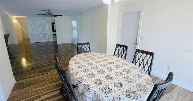 a kitchen with stainless steel appliances a sink dishwasher a stove and a refrigerator