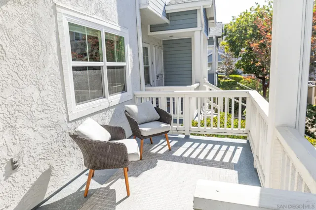 a view of porch with a bench