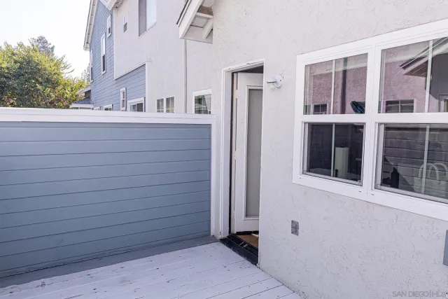 a view of kitchen with refrigerator