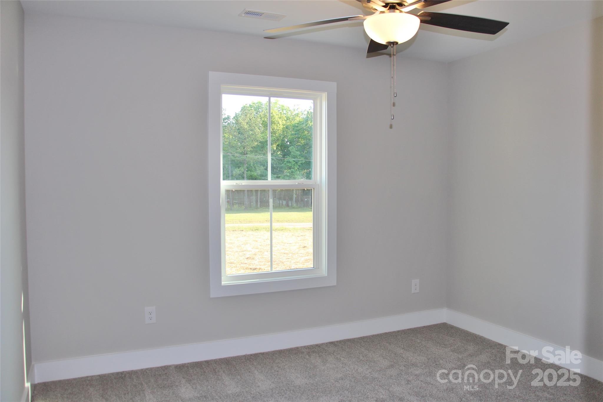 4304 Fletcher Funderburk Road Lancaster, SC 29720 - Photo 15 of 18 an empty room with a window
