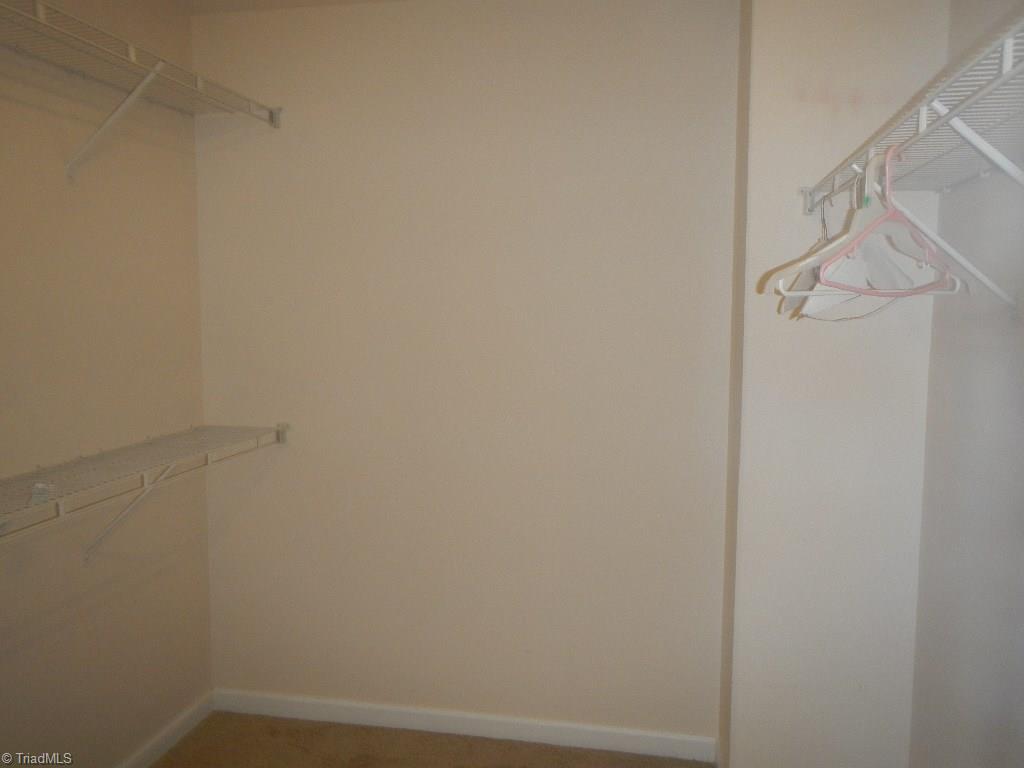 1917 Foust Road Greensboro, NC 27405 - Photo 9 of 25 Another large walk-in closet, new carpet