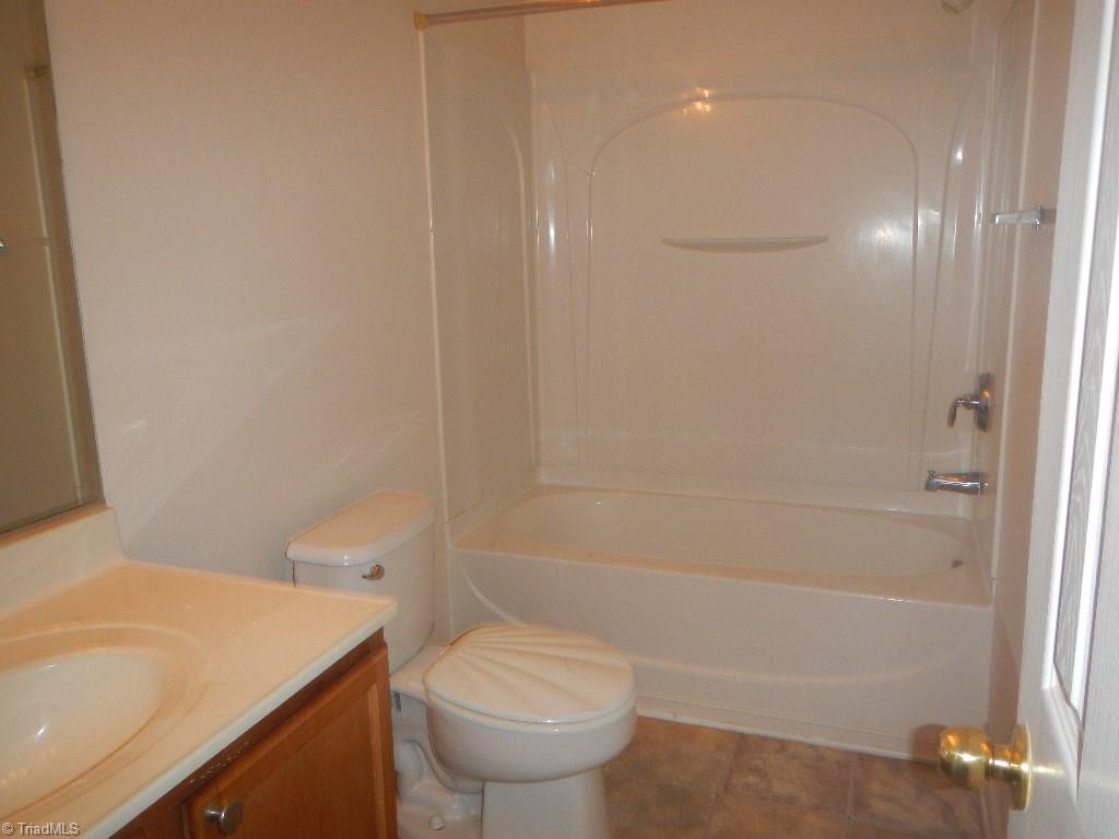 1917 Foust Road Greensboro, NC 27405 - Photo 14 of 25 Hall bathroom upstairs.