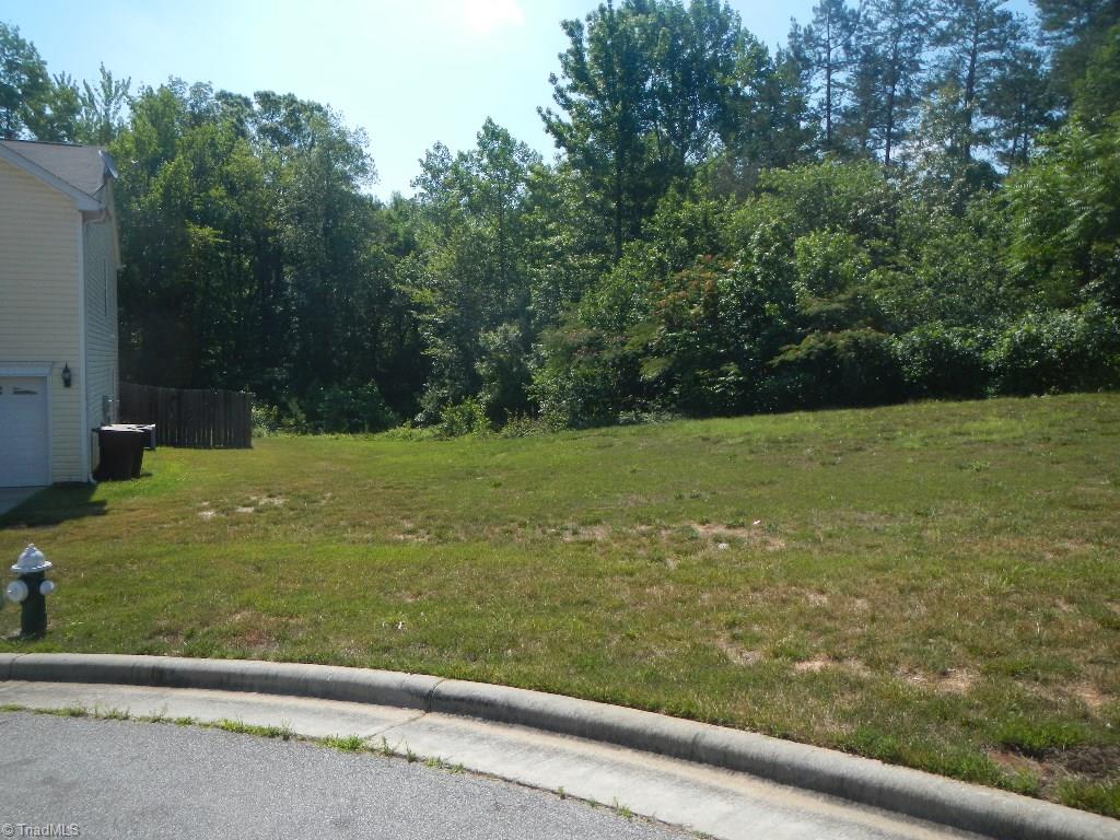 1917 Foust Road Greensboro, NC 27405 - Photo 15 of 25 Private level lot, lots of natural trees, cul de sac