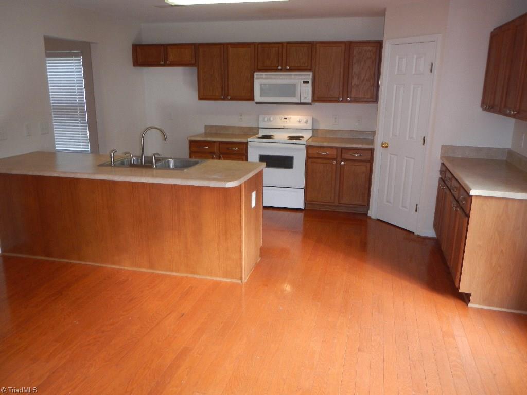 1917 Foust Road Greensboro, NC 27405 - Photo 2 of 25 Cabinets, counters galore