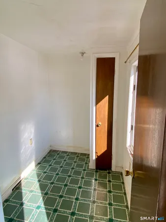 a view of entry way with wooden floor