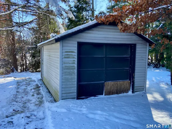 a view of a porch with a garage