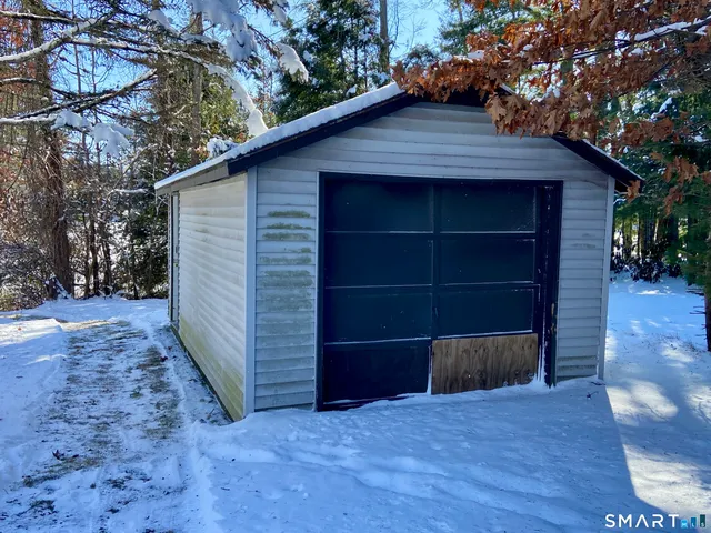a view of a porch with a garage