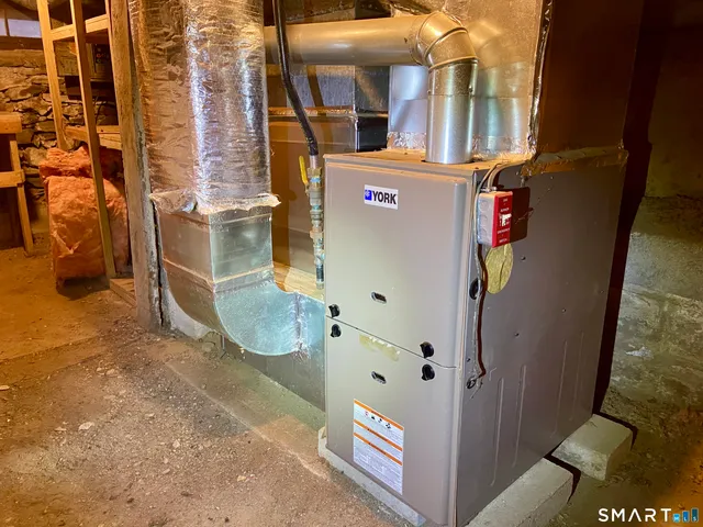 a room with furniture and a window