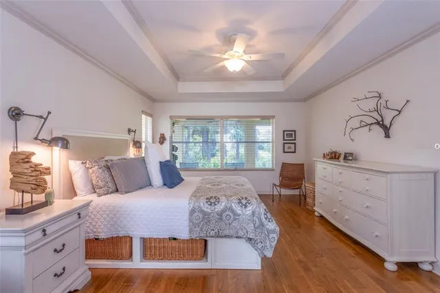 a bed room with a bed and a window