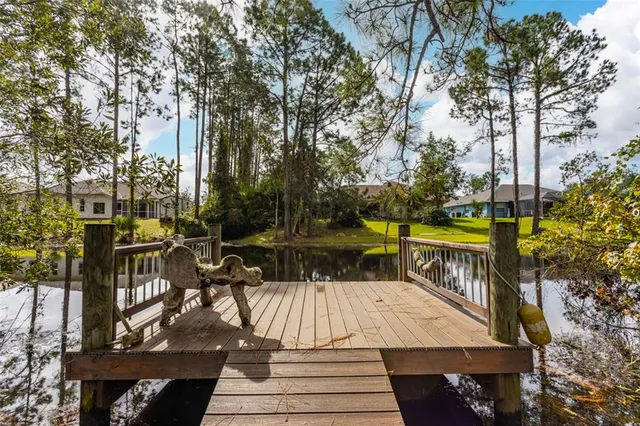 a view of a table and chairs on the deck