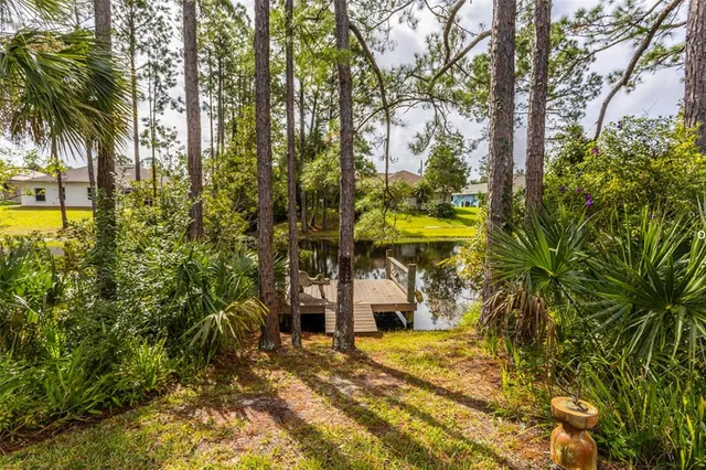 a view of a swimming pool with a lake view