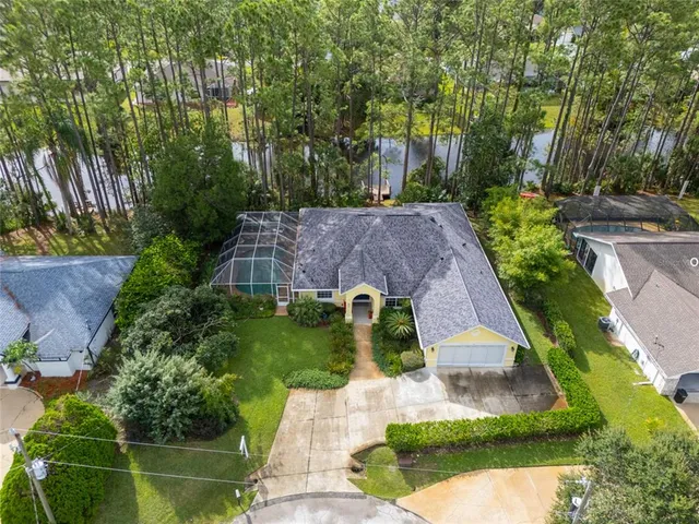 a view of swimming pool with a yard