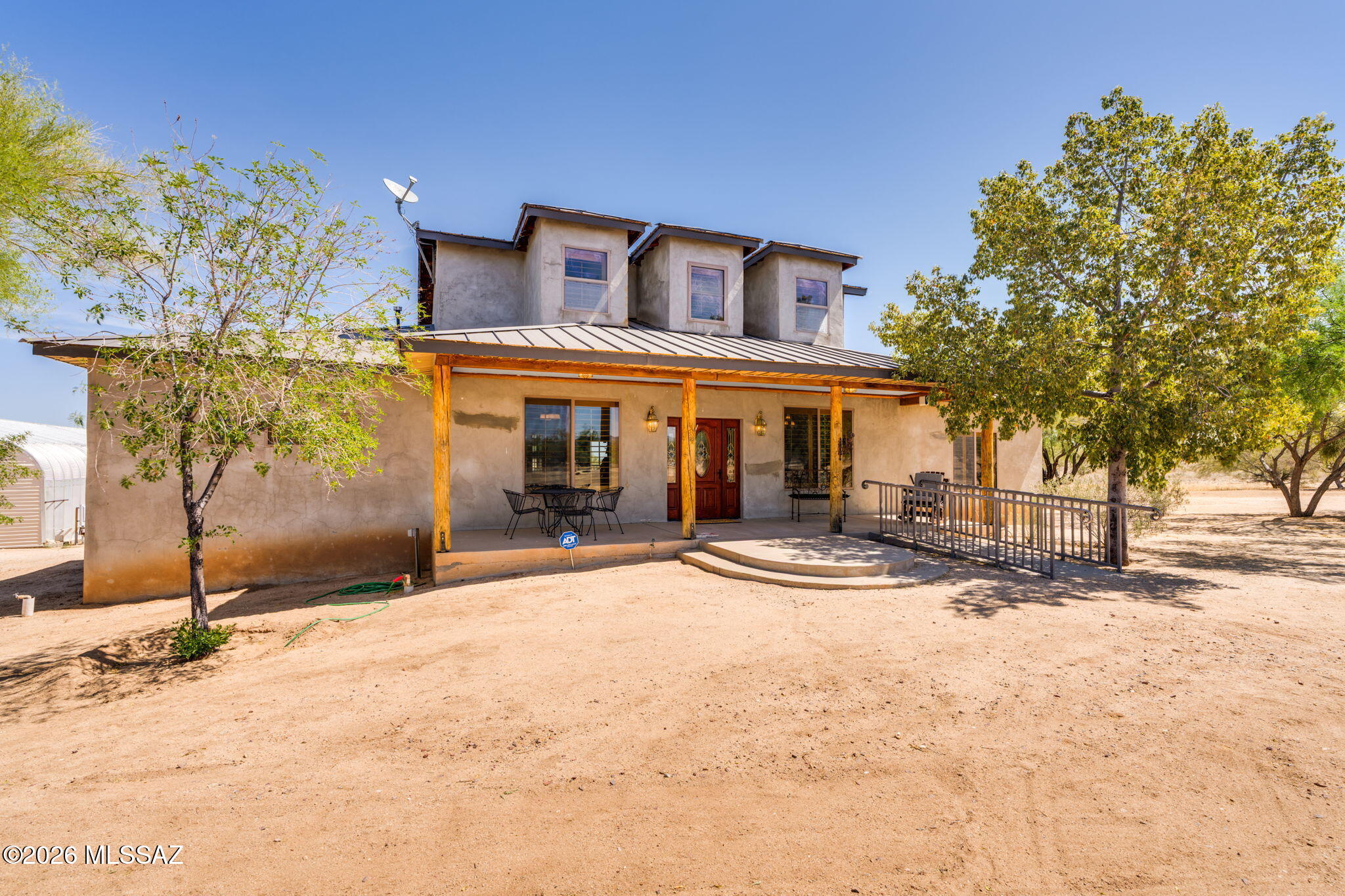 12810 West Gunsmoke Road Tucson, AZ 85736 - Photo 1 of 51 a view of a house with snow on the road