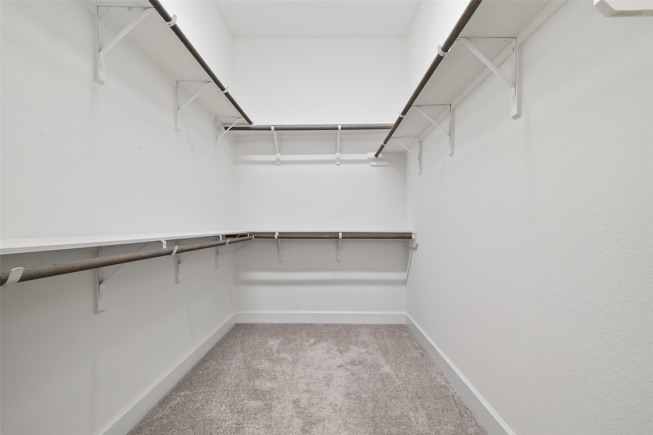 211 Amaranth Way Richmond, TX 77406 - Photo 11 of 26 a view of an empty walk in closet